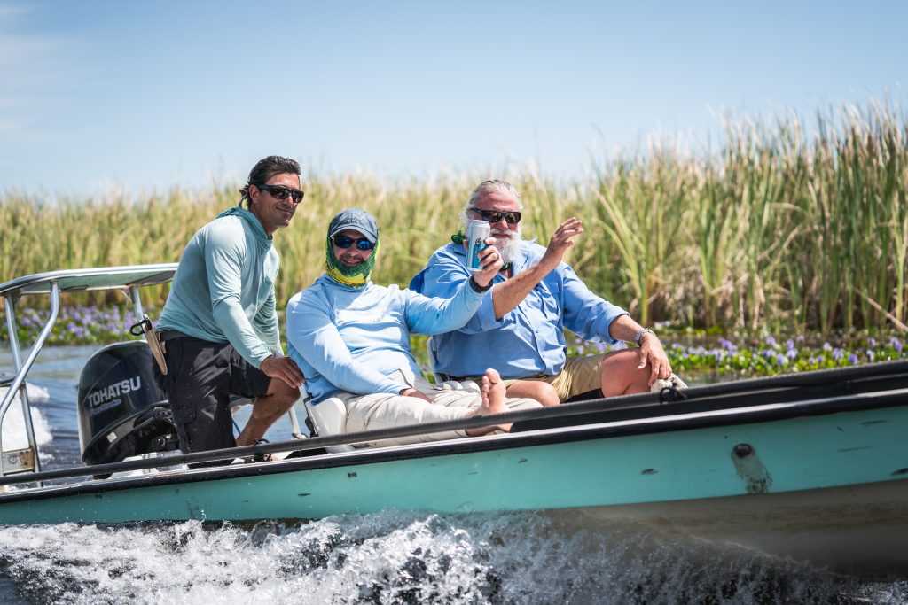 Boat ride on the marsh having a beer and having fun PH River Wizards scaled